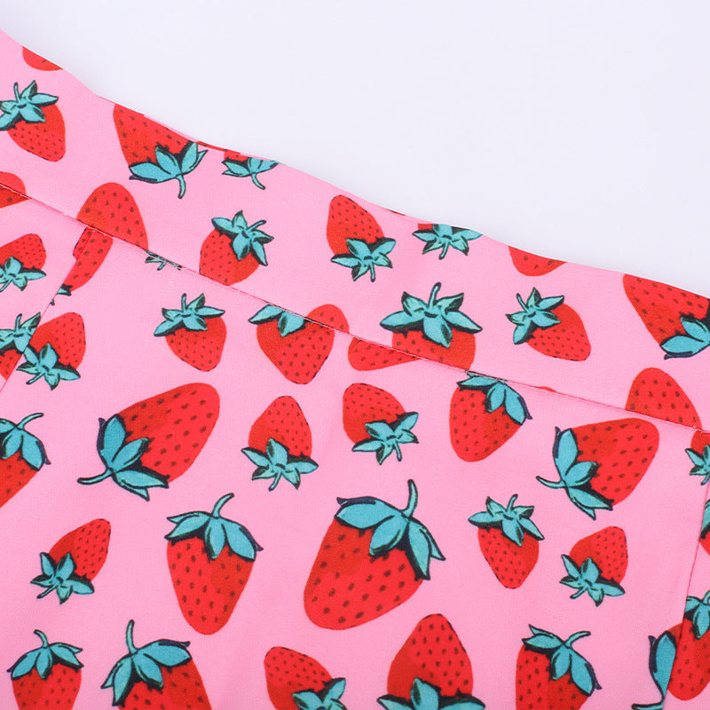 Harriet – Mini-jupe trapèze à imprimé cerise avec taille haute et fente