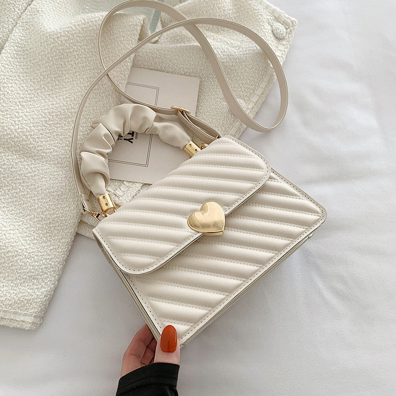 Gabrielle – Sac à bandoulière tendance avec chaîne et design métallique