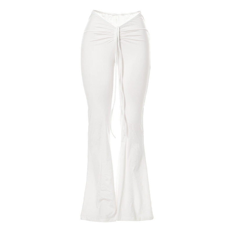 Jessica – Pantalon ample plissé à taille basse en blanc uni